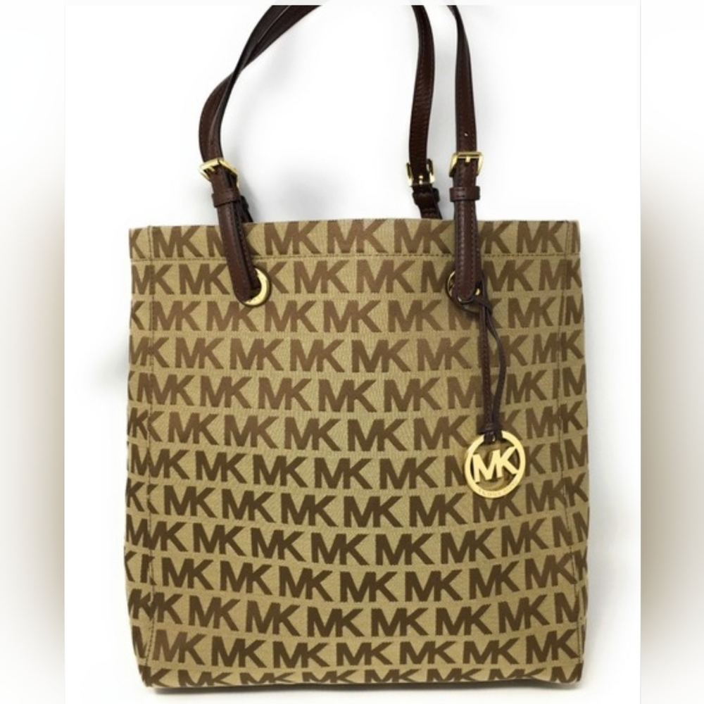 Michael Kors Signature Brown monogram shoulder bag.